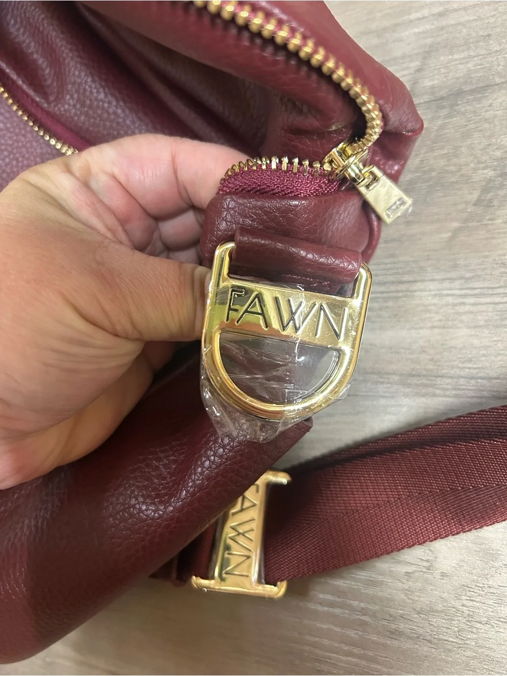 Fawn Design Pebbled Crossbody Backpack in Burgundy